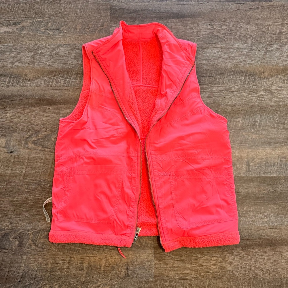 Free People Movement Hit the Hills Reversible Vest in neon coral pink